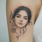 ein mikrorealistisches Tattoo von einem Gesicht