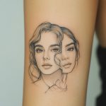 ein mikrorealistisches Tattoo von einem Gesicht